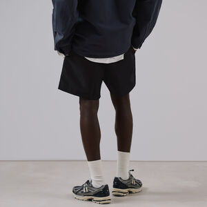 NEW BALANCE SHORT ESSENTIALS SMALL LOGO NOIR UOMO